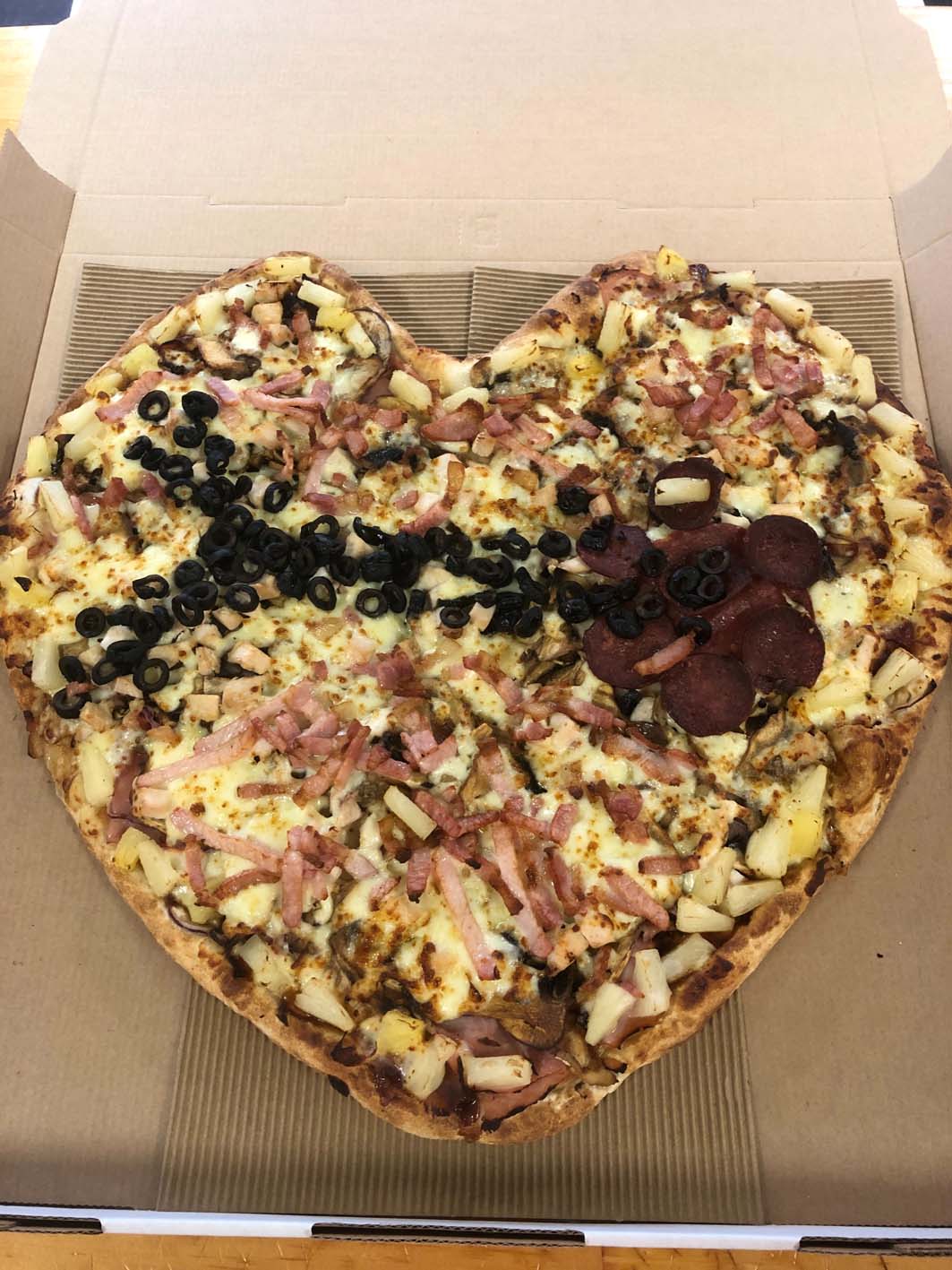 A heart shaped pizza from Mozzarella Fella