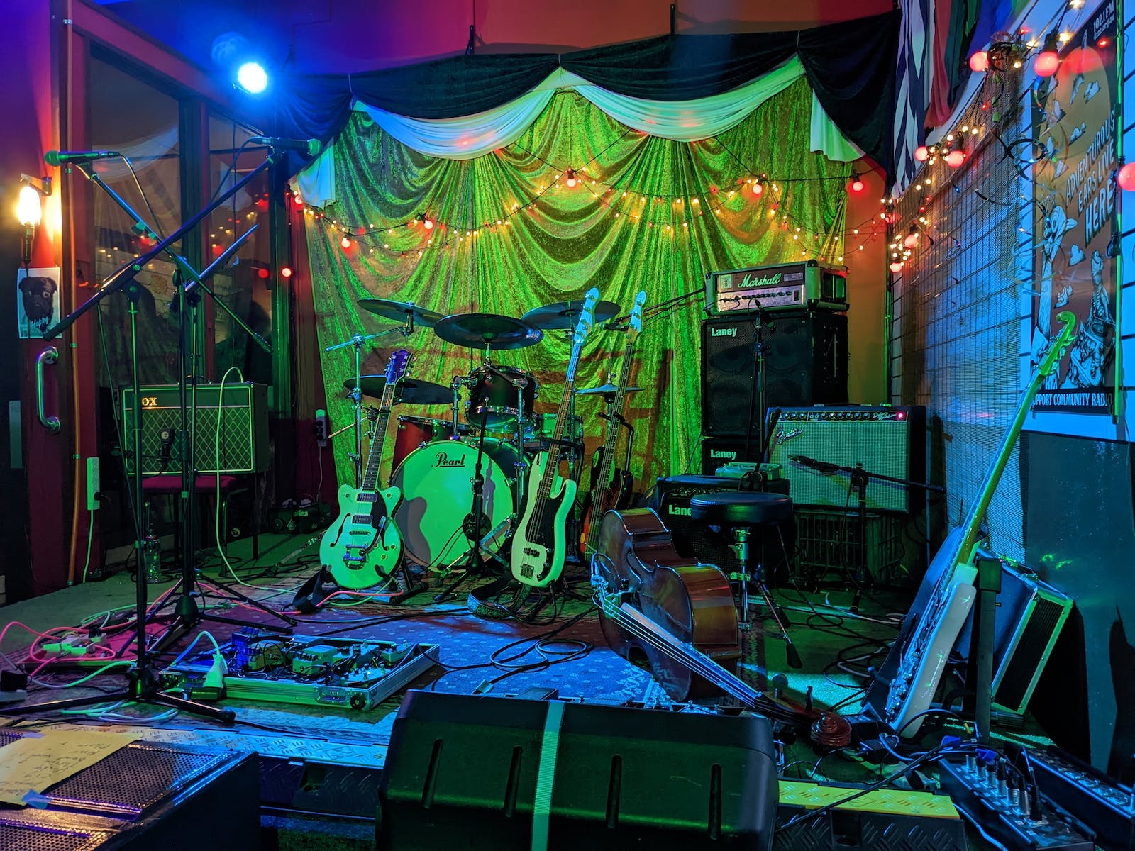 The stage at Banshees is set with instruments and drumkit